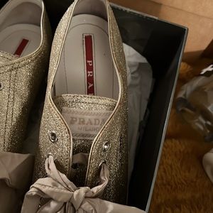 Gold glitter Prada sneakers